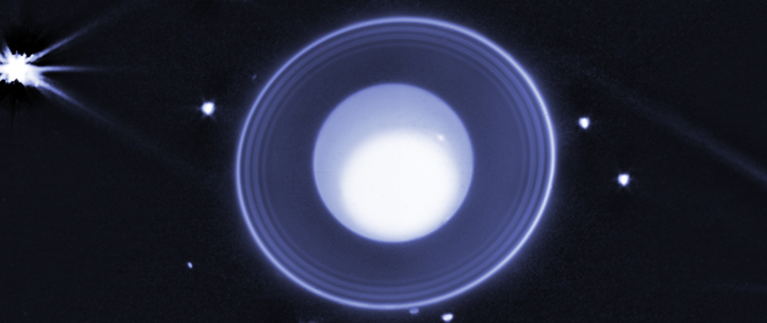 Uranus and Its New Moon — Ultrawide 1080p