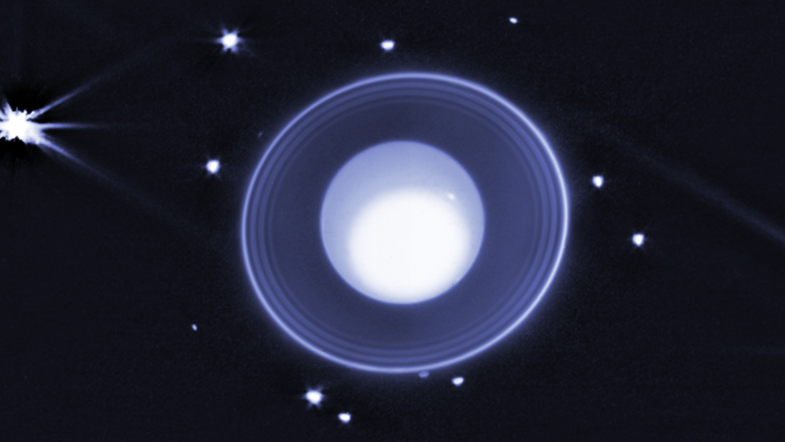 Uranus and Its New Moon