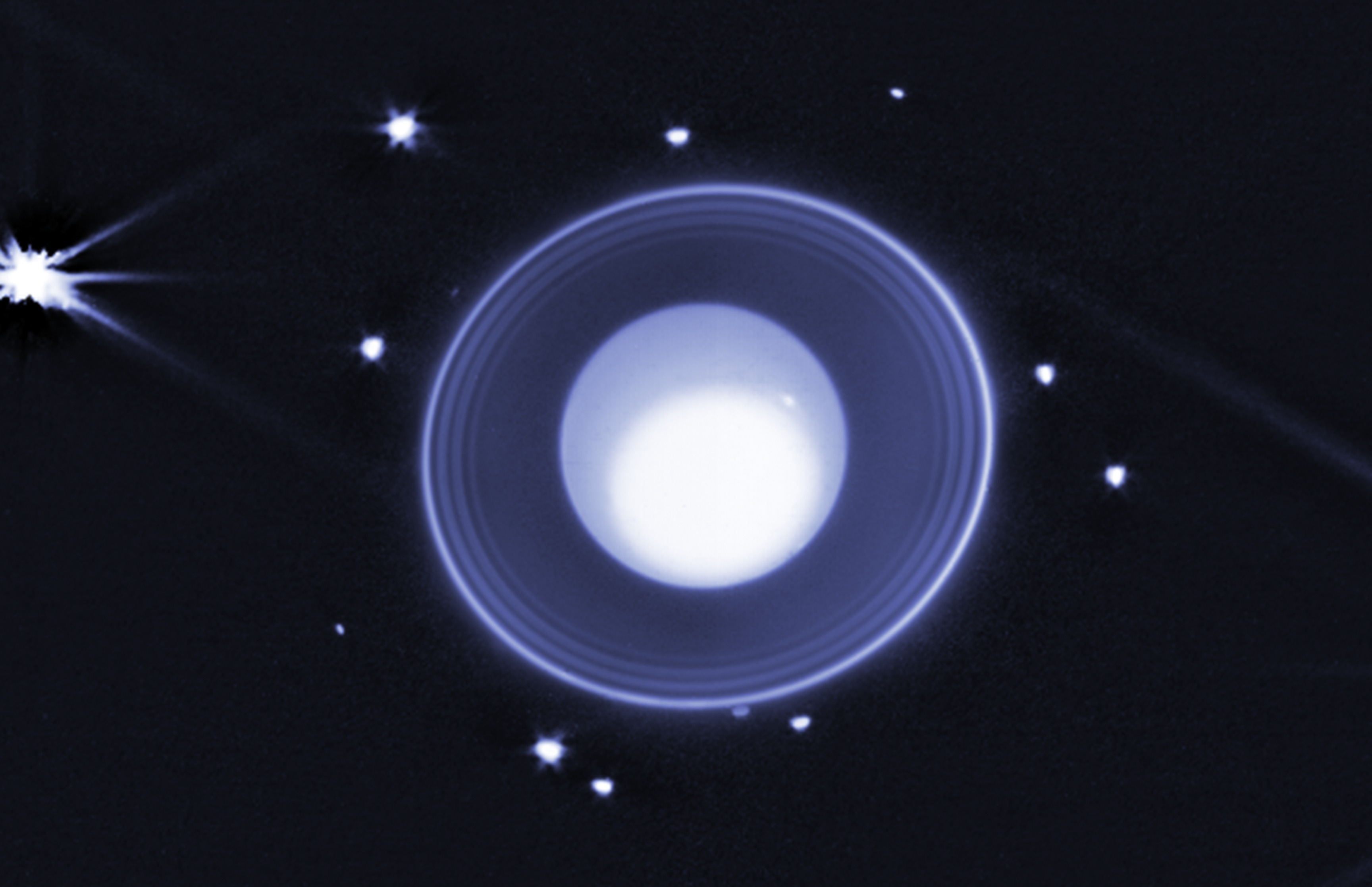 Uranus and Its New Moon — MacBook 16"